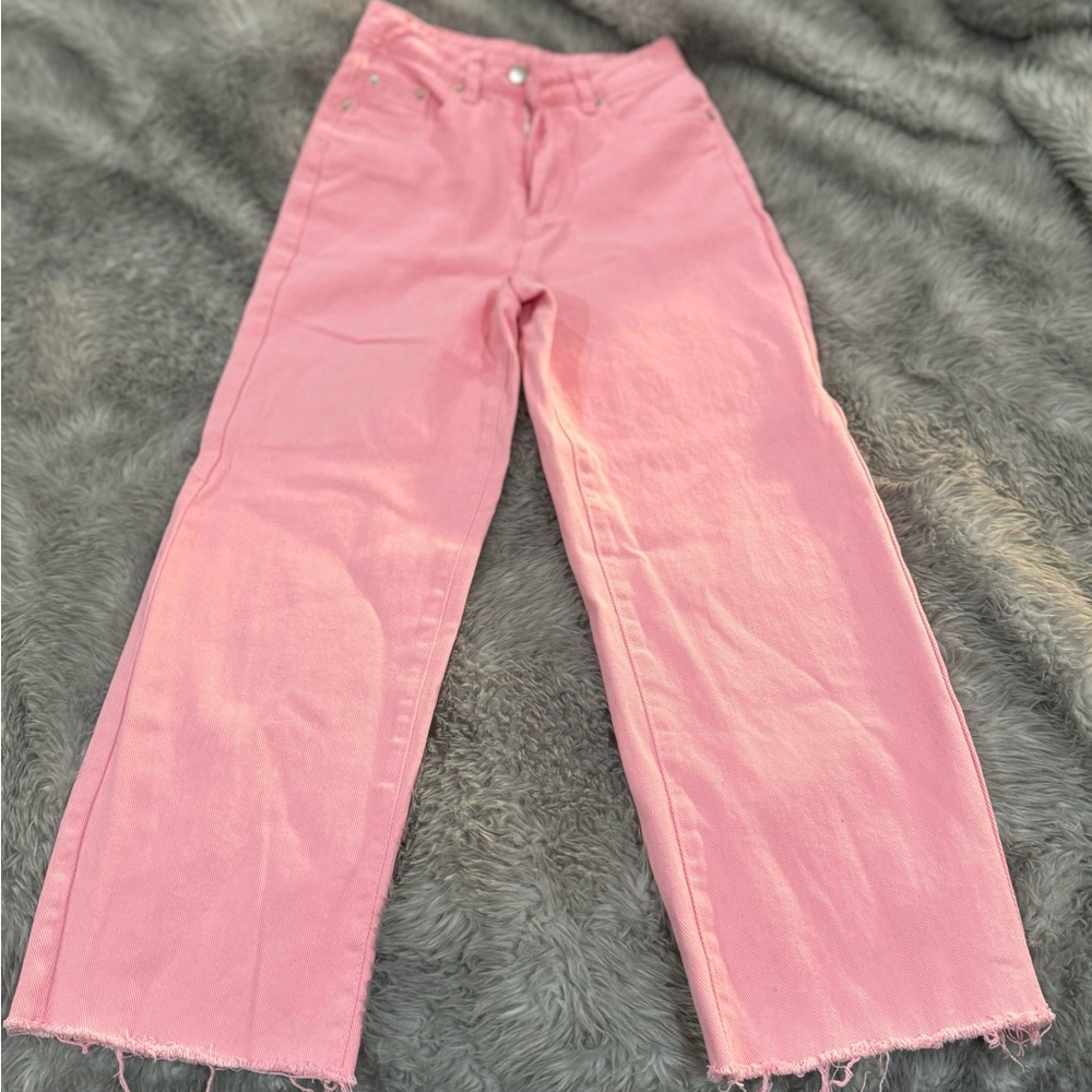 High waisted pink jeans. Wide leg